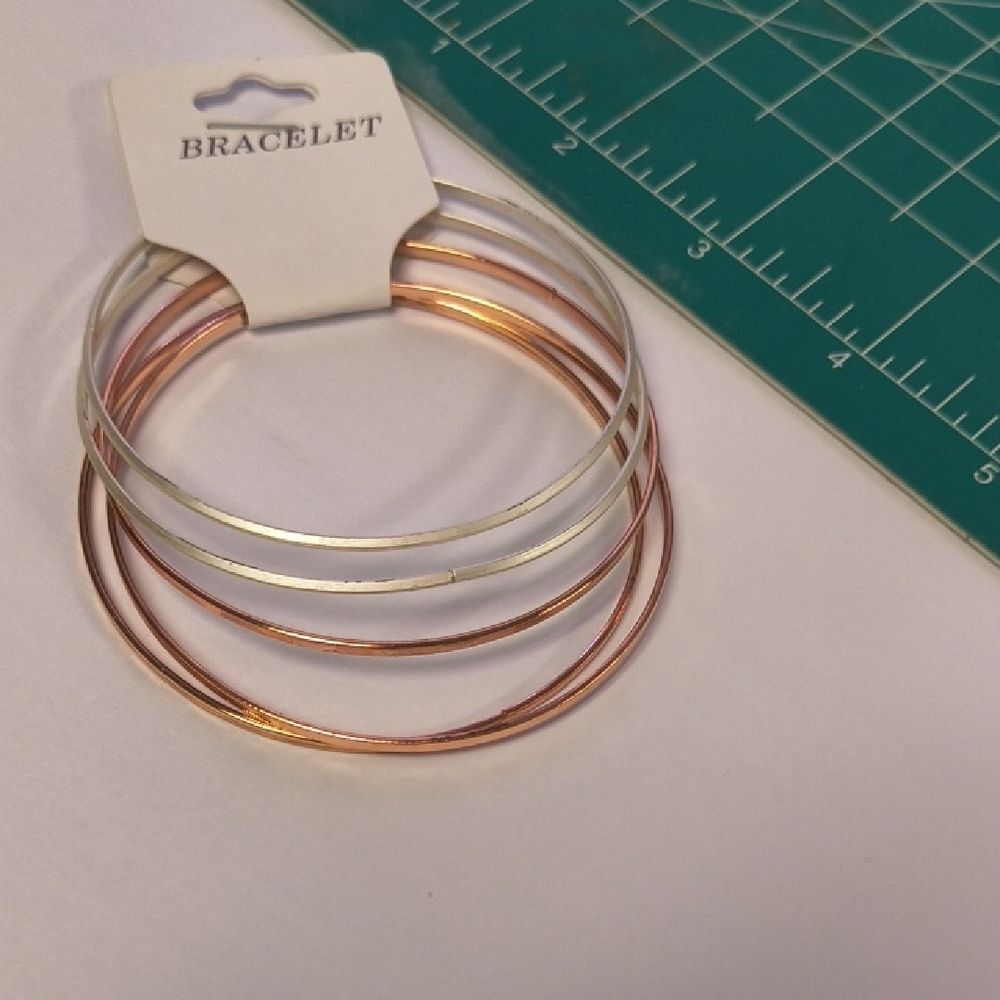 Elegant Silver and Gold Bangle Set